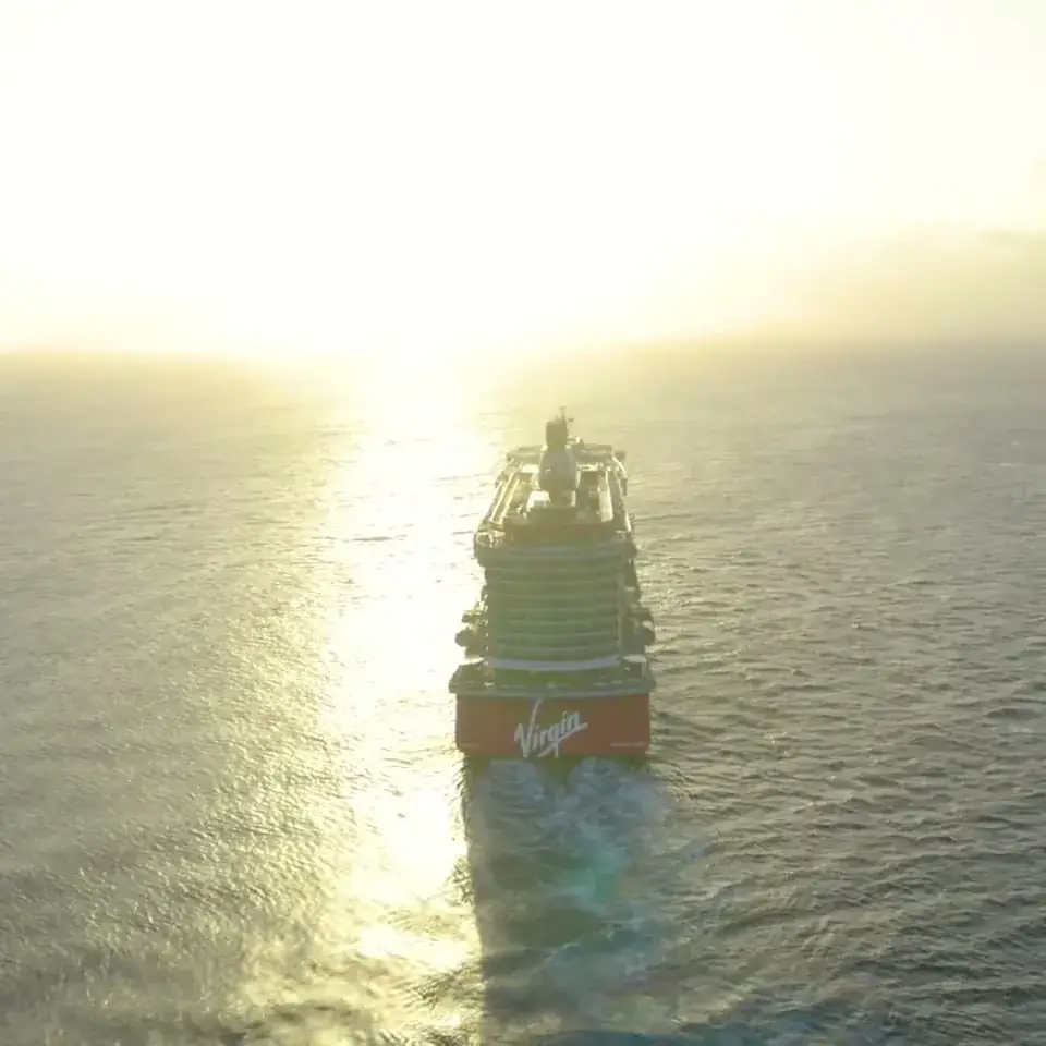 Scarlet Lady, an adults-only ship, sailing into the sunset