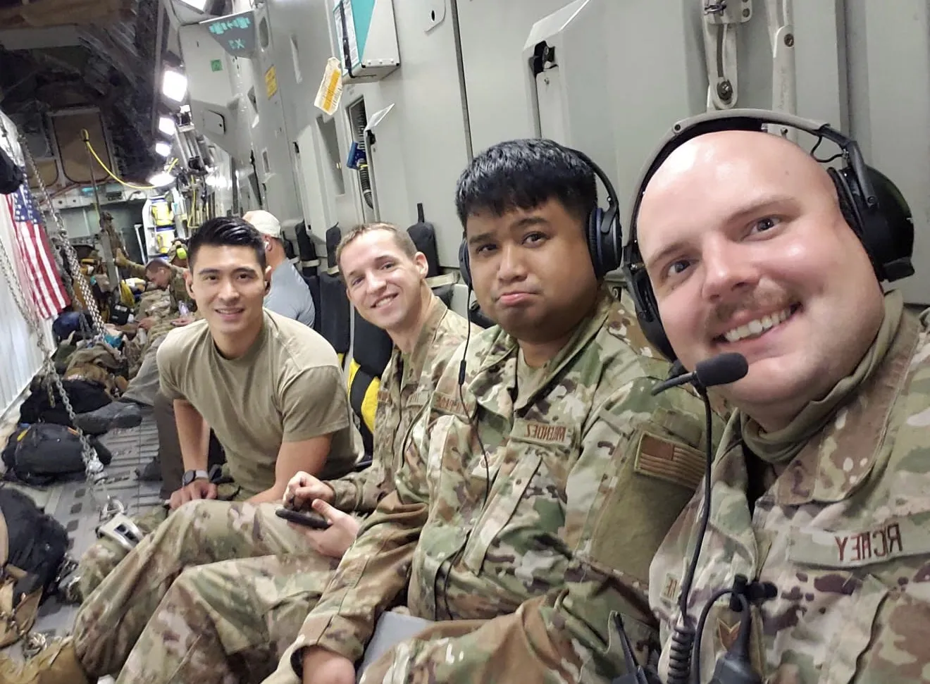Paolo Melendez with fellow Airmen aboard a C-17 during deployment operations