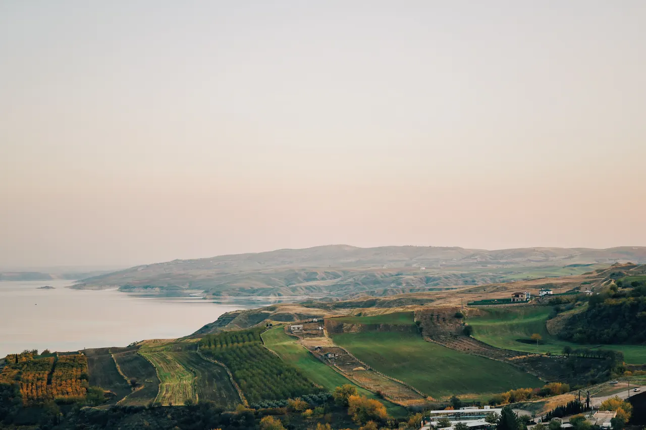 Beautiful aerial shot of diverse farmland and coastline in Adıyaman, Turkey.