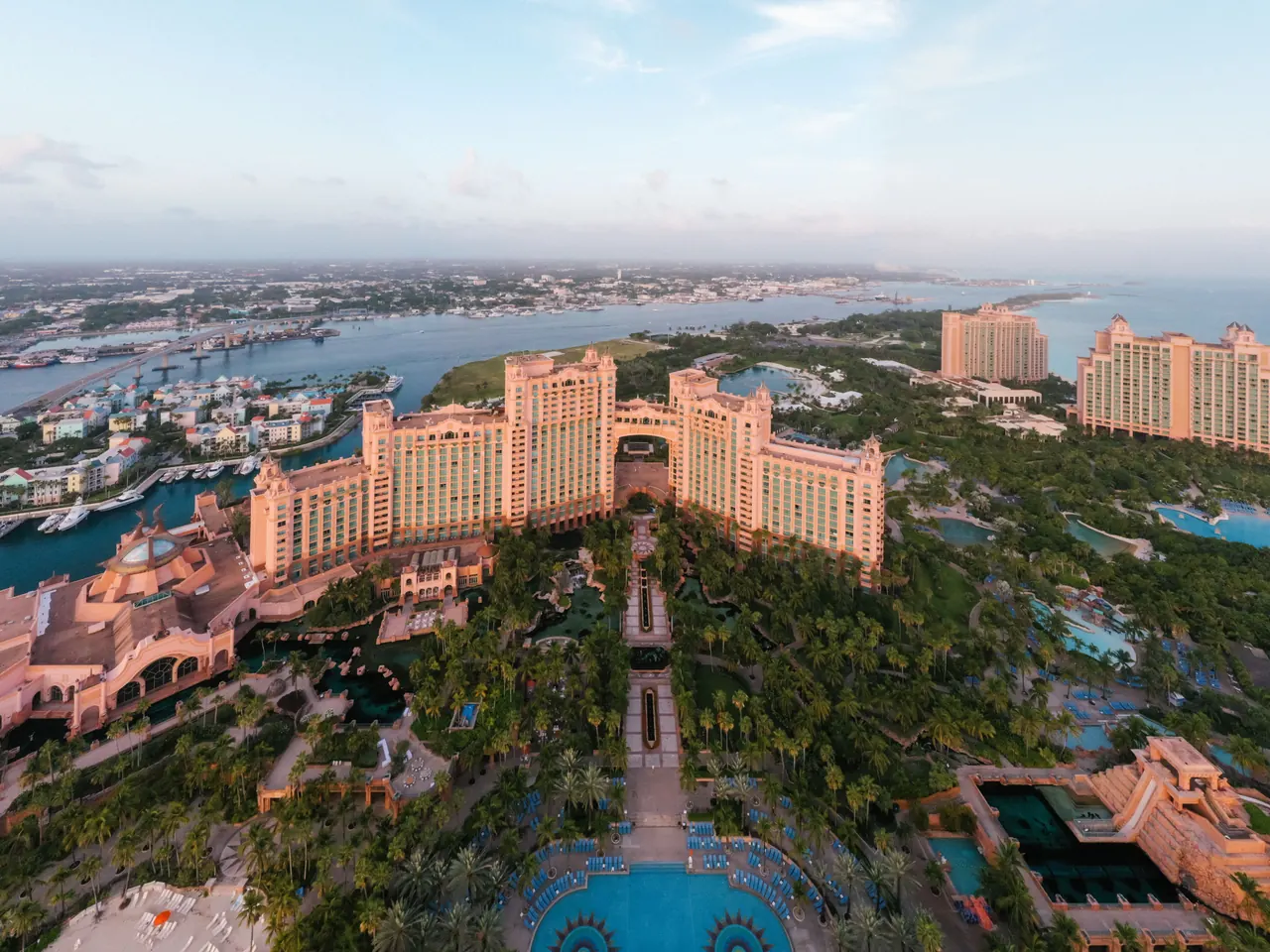 Aerial view of the Atlantis resort complex on Paradise Island, its pink towers and turquoise lagoons set against the sea