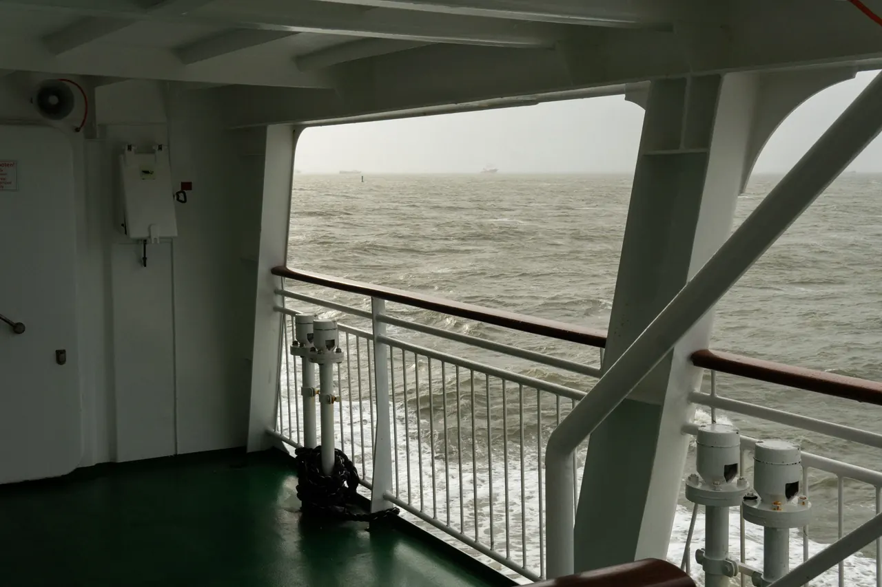 Scenic view from a ferry deck, overlooking the North Sea near Borkum, Germany.